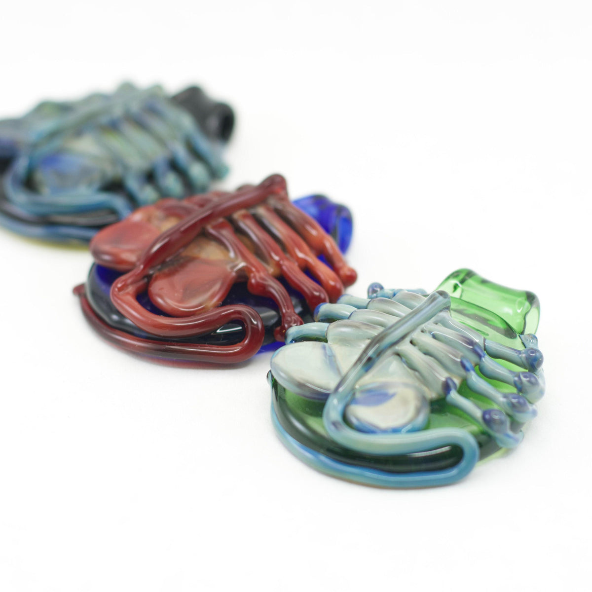 Colorful glass shoes on a white background