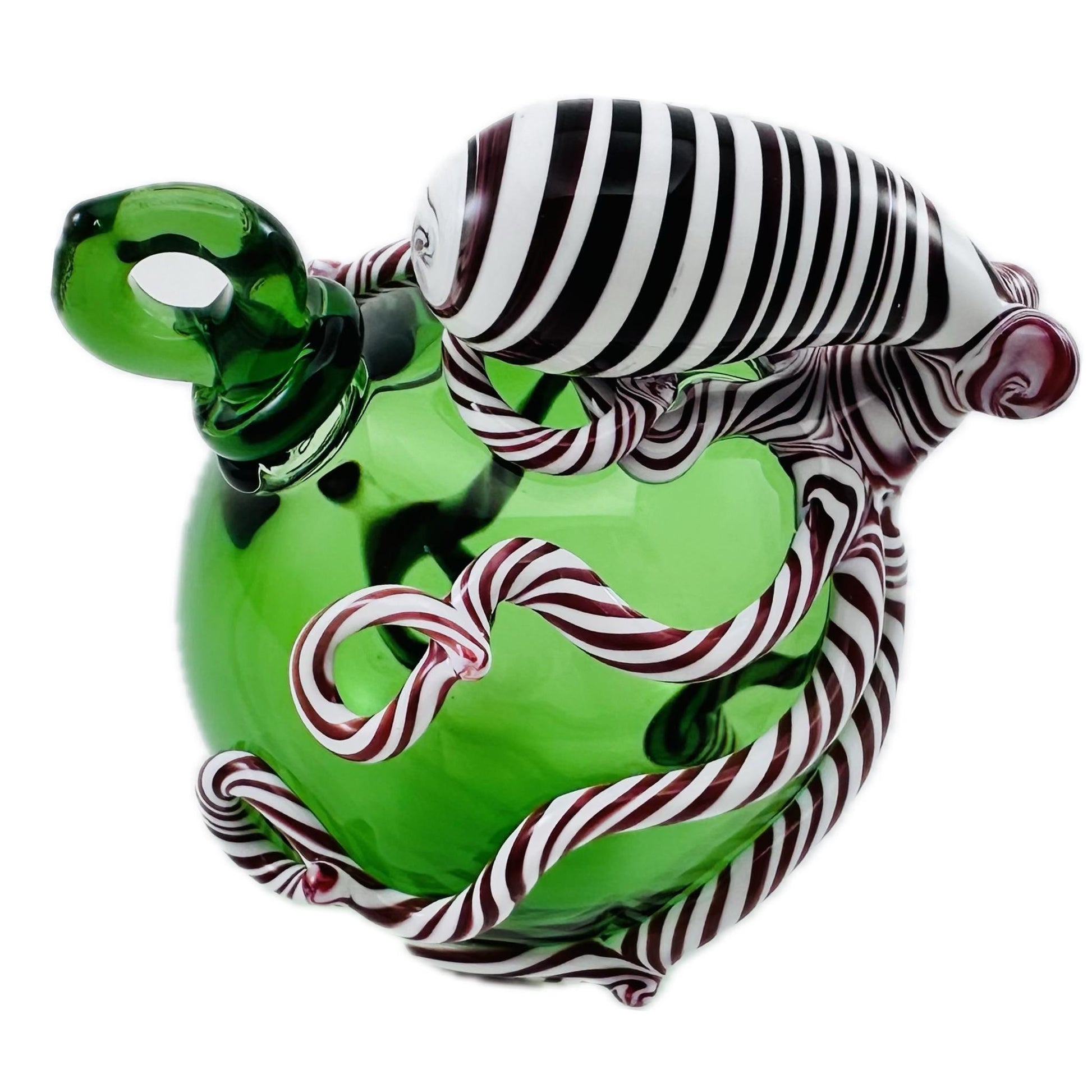 Green glass bottle with candy cane design on a white background