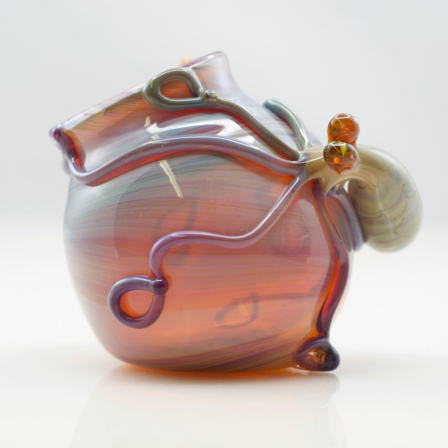 Blown glass rainbow globe terrarium with octopus sculpture